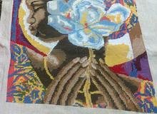 Вышитая картина "Негритянка с цветком"		