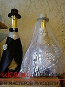 Украшенные бутылки шампанского для свадебного стола