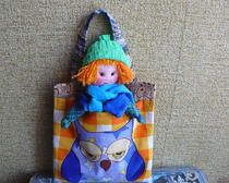 Куколка из ткани в сумочке