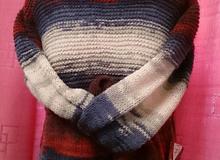 Вязаный женский меланжевый свитер.		