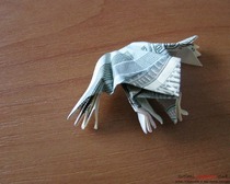 Простой способ оригами-лягушки из бумаги.