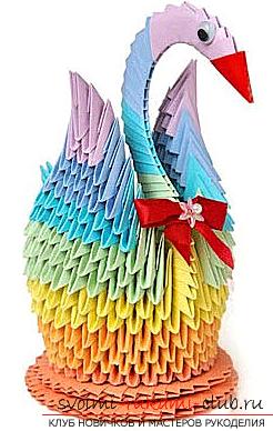 Как сделать красивую поделку в технике модульного оригами, пошаговые фото и описание работы по созданию очаровательного снеговичка и яркого лебедя из модулей разного цвета. Фото №14