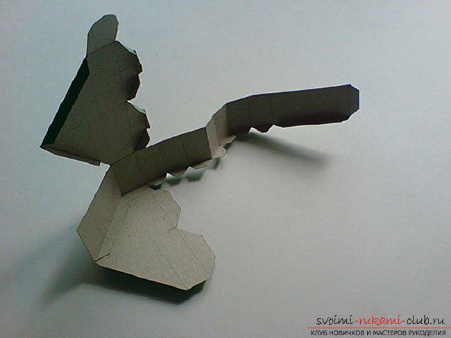 Коробочка в виде сердечка в технике оригами. Фото №4