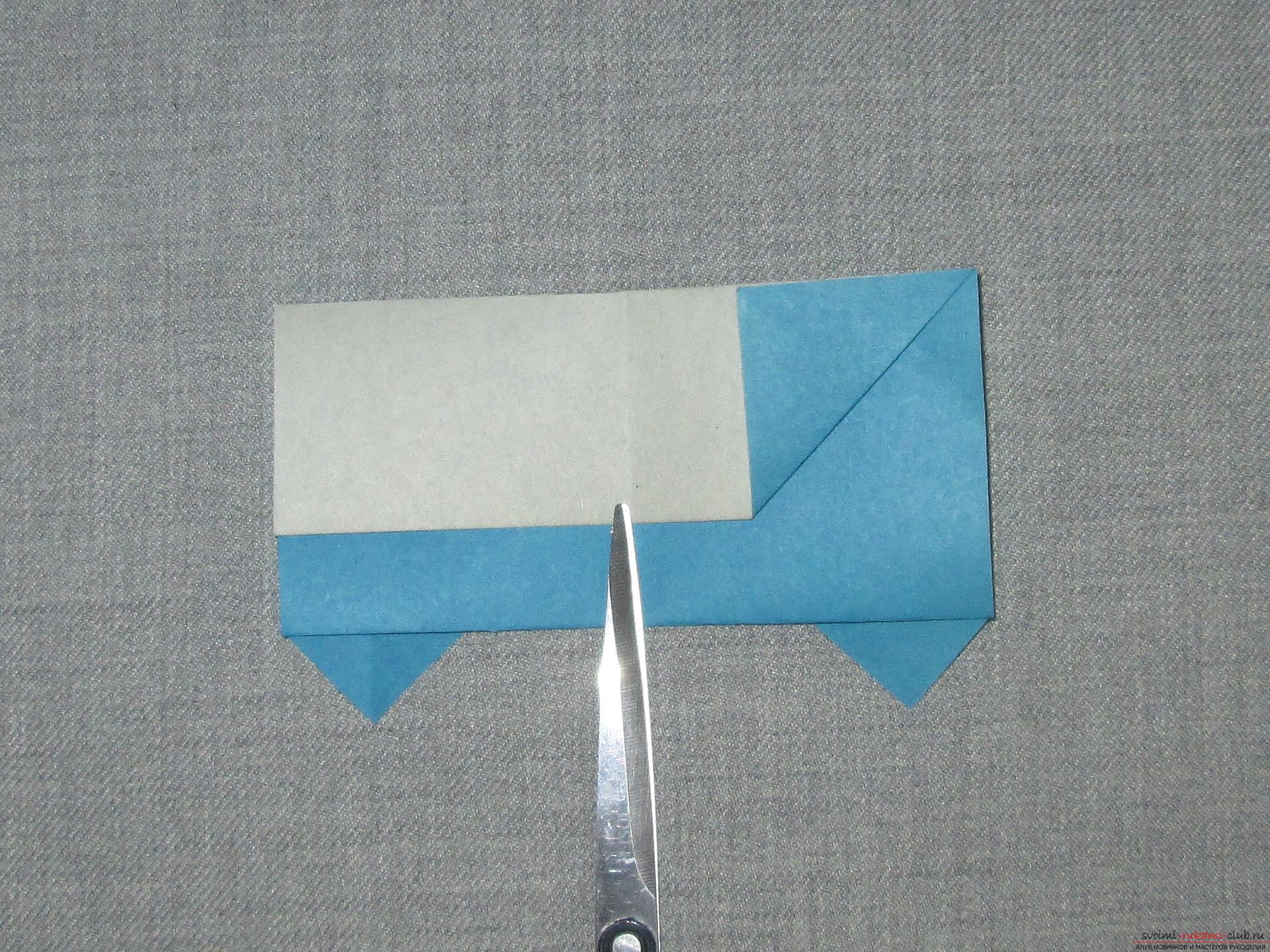 Этот подробный мастер-класс оригами из бумаги для детей 6 лет научит как сделать своими руками симпатичный автомобильчик.. Фото №9