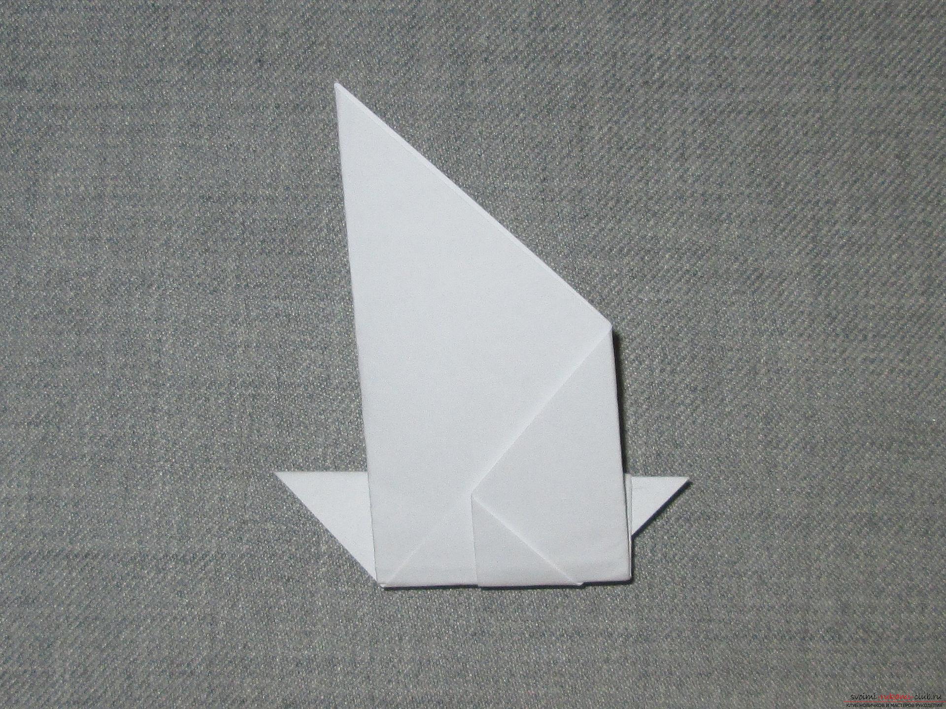 Этот подробный мастер-класс оригами для детей 8 лет научит как сделать оригами-голубя из бумаги.. Фото №7