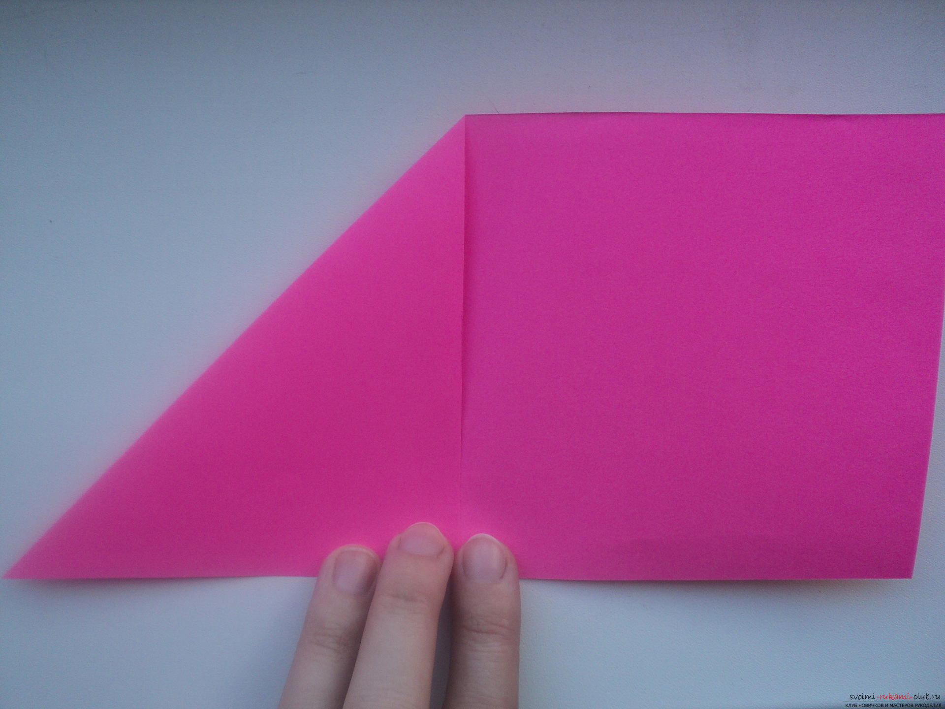 Этот подробный мастер-класс с пошаговыми фото и описанием научит как сделать своими руками оригами-сердце из бумаги.. Фото №7