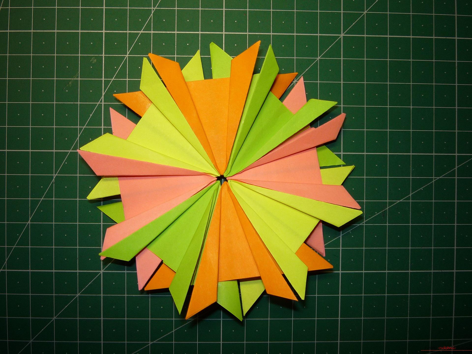 Мастер-класс расскажет как сделать модульную звезду оригами из бумаги своими руками. Фото №11