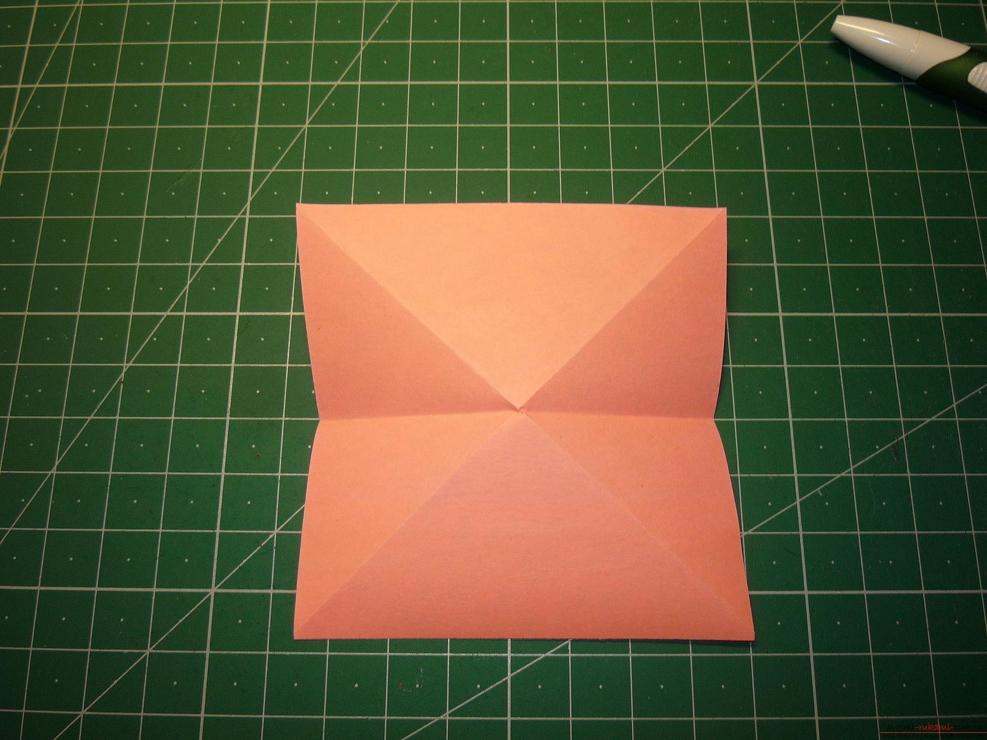 Мастер-класс расскажет как сделать модульную звезду оригами из бумаги своими руками. Фото №4