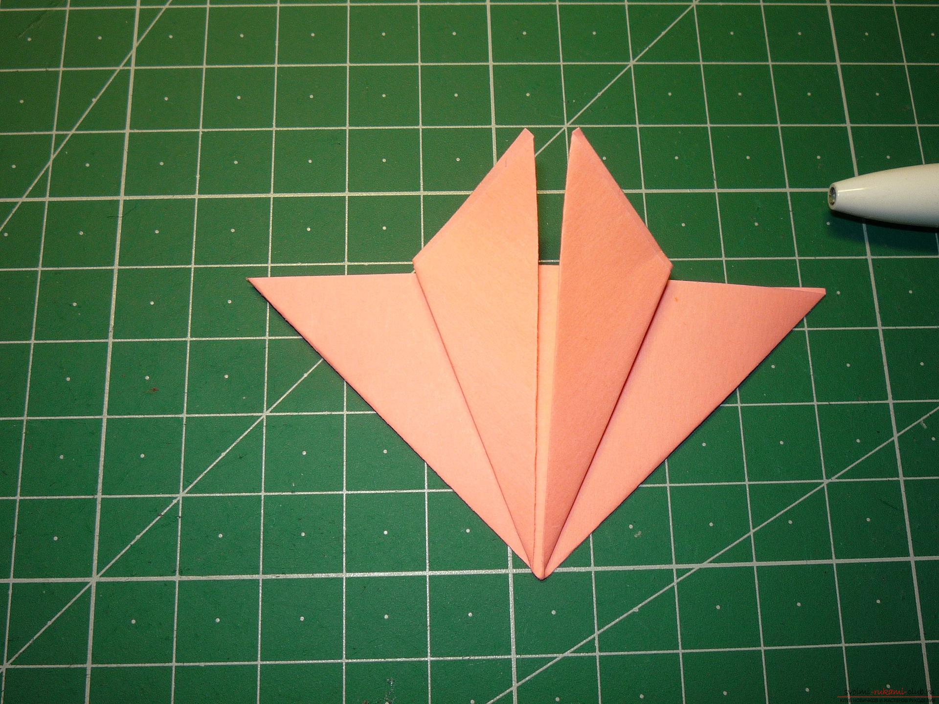 Мастер-класс расскажет как сделать модульную звезду оригами из бумаги своими руками. Фото №6