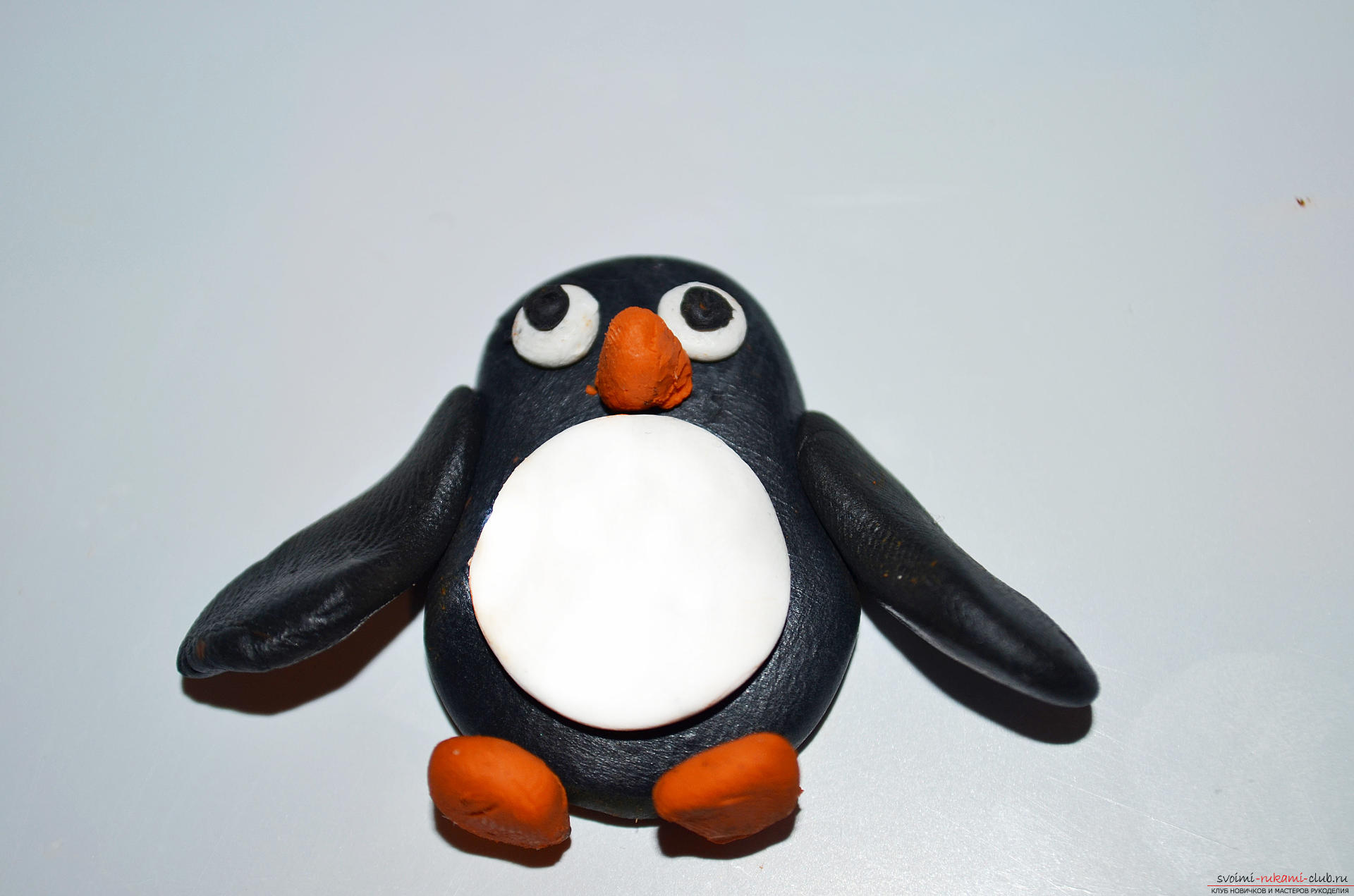 Фото к уроку лепки из полимерной глины пингвина. Фото №10